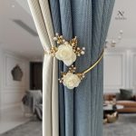 Élégant système d'attache pour rideaux