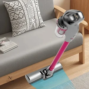 Design rose métallisé de l'aspirateur balai