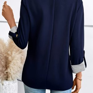 Veste chic pour femme avec fermeture à bouton et rayures