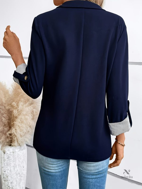 Veste chic pour femme avec fermeture à bouton et rayures