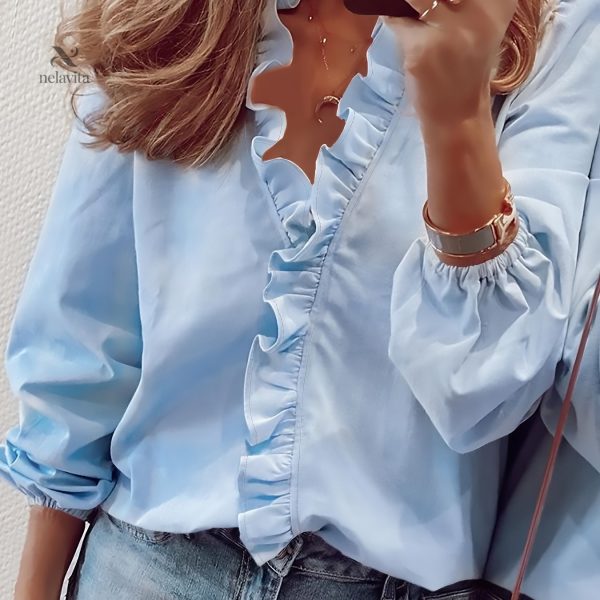 Blouse avec détails délicats et volants