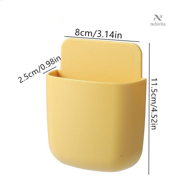 Boîte murale fonctionnelle pour téléphones et télécommandes