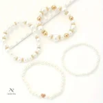 Élégants bracelets en perles blanches et dorées pour femme