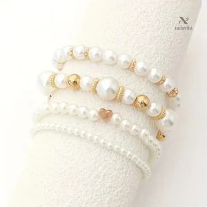 Bijoux femme : bracelets élégants en perles blanches et dorées