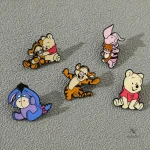 Boutons ludiques Winnie l’Ourson pour les petits