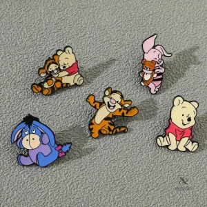 Boutons ludiques Winnie l’Ourson pour les petits