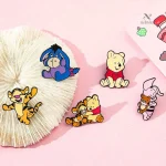 Accessoires enfant Winnie l’Ourson, broches colorées