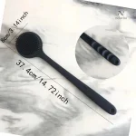 Brosse de douche ergonomique pour un soin optimal