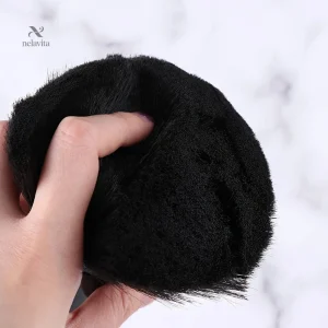 Brosse à poudre pour éliminer les résidus de cheveux