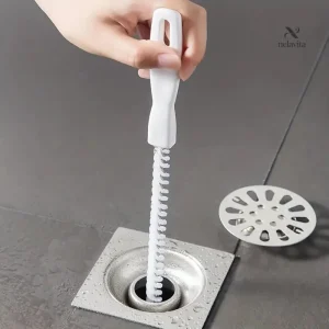 Outil anti-bouchon pour lavabo et évier