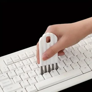 Brosse de nettoyage pour clavier compacte et efficace