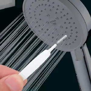 Outil de nettoyage précis pour pommeau de douche en salle de bain