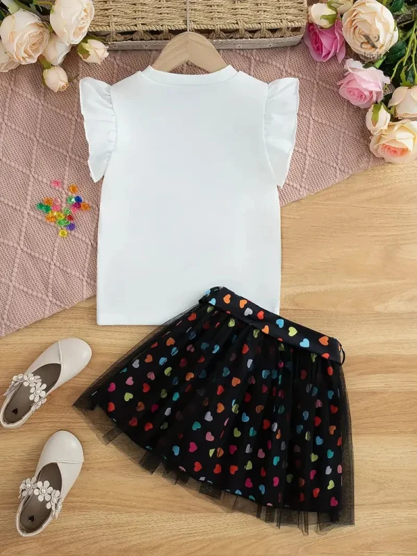 chemise-fille-blanche-a-manches-volantees-avec-jupe-noire-uoqoyp-1