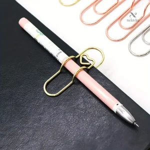 Attache stylo cœur pour maintenir vos écrits à portée de main