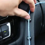 Accessoire intérieur pour maintenir les câbles en ordre