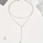 Bijou femme raffiné perles blanches et doré