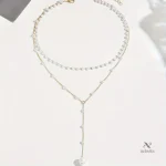 Collier mariage femme perles et chaîne dorée élégant
