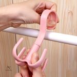 Porte-ceintures rotatif pour un accès facile aux vêtements