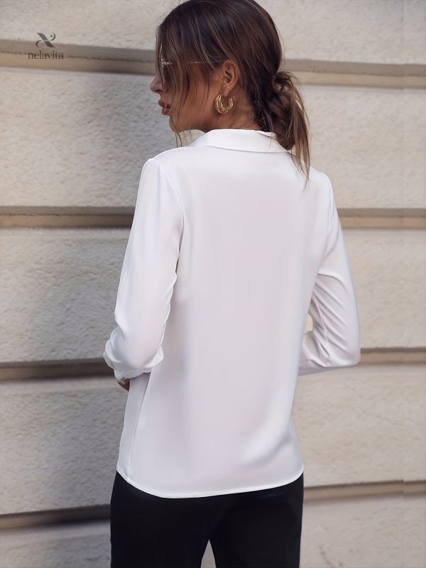 Blouse femme ajustée avec détails en perles