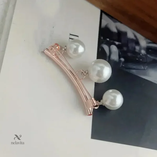 Épingle à cheveux élégante avec perles blanches