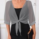 Blouse délicate avec nœud pour un style unique