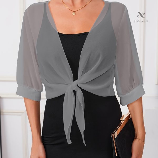 Blouse délicate avec nœud pour un style unique