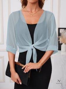 Blouse transparente avec nœud décoratif