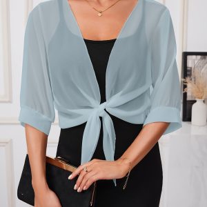 Blouse transparente avec nœud décoratif