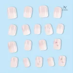 Faux ongles élégants roses avec design floral en relief