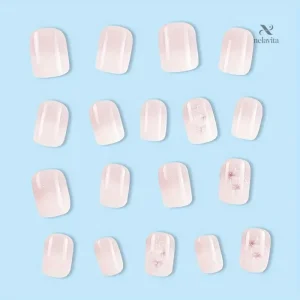 Faux ongles élégants roses avec design floral en relief
