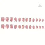 Faux ongles rose nude avec design blanc et strass