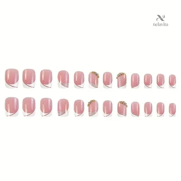 faux-ongles-rose-nude-avec-design-blanc-et-strass-kit-24-z0k5pg-1 Faux ongles rose nude avec design blanc et strass