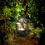 Luminaires extérieurs design avec fontaine et statue décorative