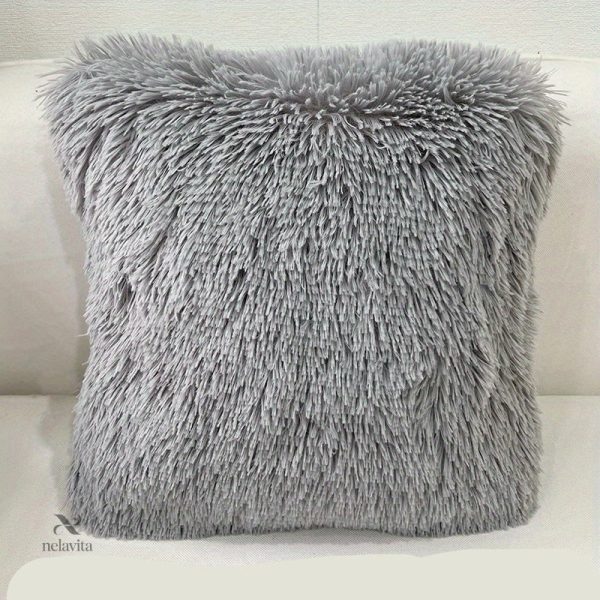 Coussin décoratif en fausse fourrure douce