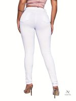 Jean slim taille haute, finition usée pour un style tendance