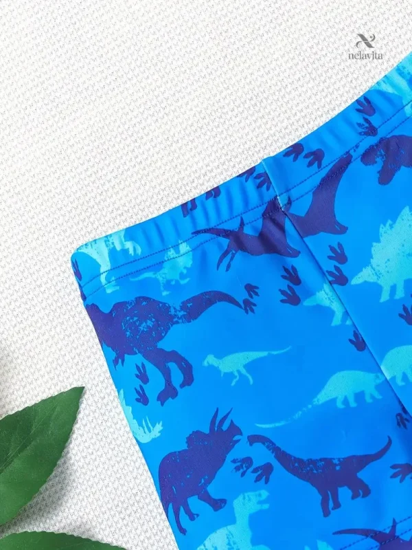 maillot-de-bain-garcon-bleu-motif-dinosaures-short-de-bai-q9y9so-1