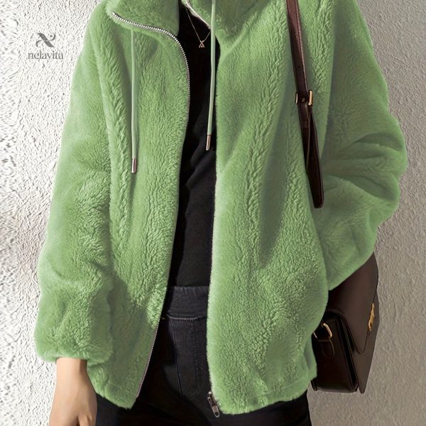 Manteau tendance avec finition zippée