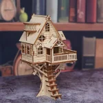 Outils de modélisme : maquette en bois de maison dans les arbres
