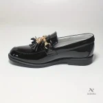 Mocassins noirs vernis garçon avec pampilles élégantes