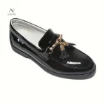 Chaussures noires garçon avec détails en pampilles