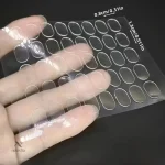 Fixation discrète pour ongles avec pastilles adhésives