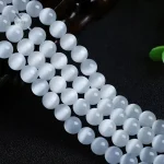 Perles de pierre de lune blanches idéales pour bijoux