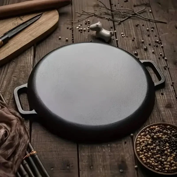 Poêle robuste pour cuisson au feu de bois