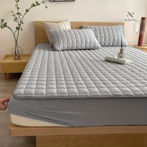 Matelas protégé avec un couvre-matelas matelassé