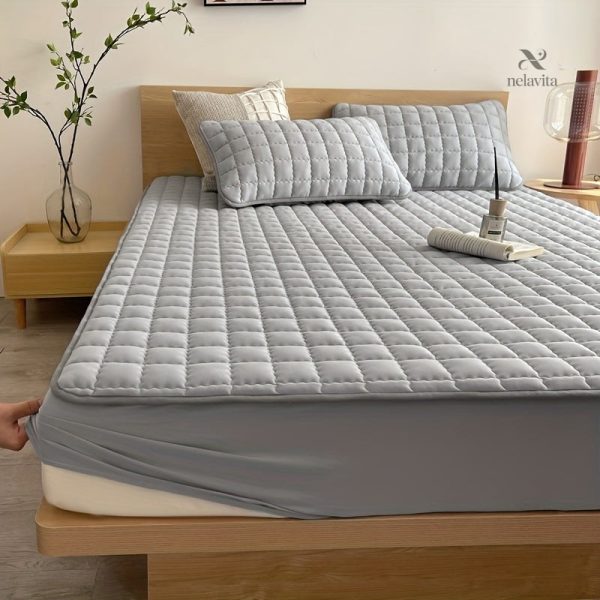 Matelas protégé avec un couvre-matelas matelassé