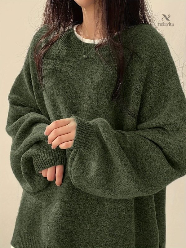 Pull uni à manches longues, design avec fente latérale