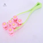 Rouleau de massage visage et cou en fleurs pour relaxation
