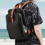 Accessoire en cuir noir pour homme, bretelles marron contrastées