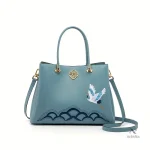 Sac à main bleu pour femme, broderie grue et dorures