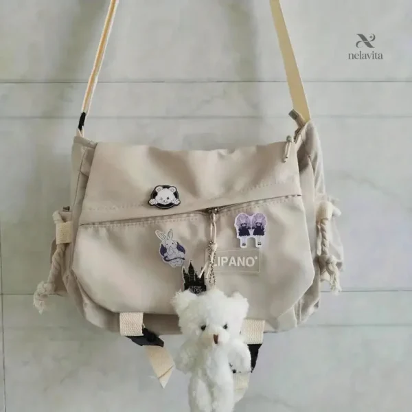 sac-besace-femme-style-coreen-avec-peluche-bandouliere-de-xf7cch-1